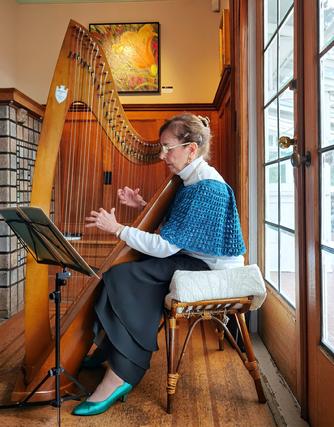 woman playing harp